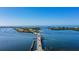 Breathtaking aerial view of a coastal bridge offering stunning ocean views and easy island access at 1960 Oregon Trl # 2B, Englewood, FL 34224