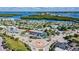 Overhead view featuring a roundabout surrounded by local businesses and island scenery at 1960 Oregon Trl # 2B, Englewood, FL 34224