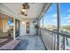 Waterfront balcony with charming decor, perfect for relaxing and enjoying the view at 1960 Oregon Trl # 2B, Englewood, FL 34224