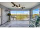 Relaxing balcony offering a view of the tranquil waterfront and lush scenery at 1960 Oregon Trl # 2B, Englewood, FL 34224