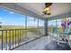Spacious balcony boasting serene water views and outdoor seating at 1960 Oregon Trl # 2B, Englewood, FL 34224