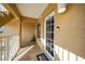 Welcoming porch with a decorative wreath, and a secure door at 1960 Oregon Trl # 2B, Englewood, FL 34224