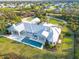 A stunning house boasts a pool, patio, and neatly manicured landscaping at 27320 Egret Pl, Punta Gorda, FL 33983