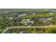 Aerial view of the luxurious estate, nestled amidst lush greenery and winding waterways at 27320 Egret Pl, Punta Gorda, FL 33983