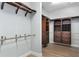 Spacious walk-in closet with custom shelving and ample storage space at 27320 Egret Pl, Punta Gorda, FL 33983