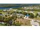 Aerial view of home with a boat dock on the bay access canal at 28482 Coco Palm Dr, Punta Gorda, FL 33982