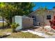 Backyard shed and water tank for storage, perfect for hobbies or additional outdoor space at 28482 Coco Palm Dr, Punta Gorda, FL 33982