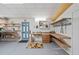 Spacious basement featuring an exit door and functional work/storage spaces at 28482 Coco Palm Dr, Punta Gorda, FL 33982