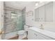 Updated bathroom features a glass-enclosed shower, modern vanity, and fixtures at 28482 Coco Palm Dr, Punta Gorda, FL 33982