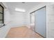 Walk-in closet with built-in shelving and sliding door at 28482 Coco Palm Dr, Punta Gorda, FL 33982