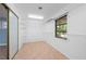 Walk-in closet with built-in shelving and natural light from window at 28482 Coco Palm Dr, Punta Gorda, FL 33982