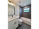 Stylish bathroom featuring modern fixtures, including a shower and sleek vanity at 2920 Barry Rd, North Port, FL 34286