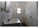 Clean bathroom features white vanity, neutral tones, and modern fixtures at 351 S Mccall Rd, Englewood, FL 34223