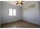 A light and airy bedroom featuring neutral paint, and tile flooring at 351 S Mccall Rd, Englewood, FL 34223