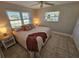 Cozy bedroom featuring tile floors, and two windows for plenty of natural light at 529 Belvedere Ct, Punta Gorda, FL 33950