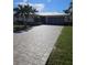 Charming single-story home featuring an attached garage and an expansive driveway at 529 Belvedere Ct, Punta Gorda, FL 33950
