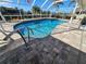 Screened-in pool with pavers and beautiful water, great for Florida relaxation at 529 Belvedere Ct, Punta Gorda, FL 33950