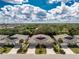 Aerial view of a home with well-maintained landscaping, and a private driveway at 7393 West Lenox Cir, Punta Gorda, FL 33950