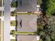 Detailed aerial view shows a home with a well-maintained backyard and landscaping at 7393 West Lenox Cir, Punta Gorda, FL 33950