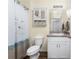 Bathroom showing shower with curtain, medicine cabinet, and vanity with storage at 7393 West Lenox Cir, Punta Gorda, FL 33950