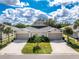 Aerial view of paired villas showing well-maintained landscaping and private driveways at 7393 West Lenox Cir, Punta Gorda, FL 33950