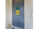 A welcoming front door with a pineapple decoration adds a touch of charm at 7393 West Lenox Cir, Punta Gorda, FL 33950