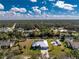 Aerial view of property bordering the river and surrounding neighborhood at 1052 Eppinger Dr, Port Charlotte, FL 33953