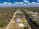 Aerial view of property featuring waterfront, backyard, and neighborhood at 1052 Eppinger Dr, Port Charlotte, FL 33953