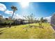 Scenic backyard featuring lush green grass and views of the water at 1052 Eppinger Dr, Port Charlotte, FL 33953