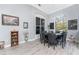Bright dining room with lots of light, complemented by stylish decor and wood-look flooring at 1052 Eppinger Dr, Port Charlotte, FL 33953