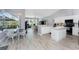 Spacious open concept with kitchen, breakfast nook, and living space with bright light and luxury finishes at 1052 Eppinger Dr, Port Charlotte, FL 33953