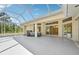 Spacious screened patio featuring a hot tub, ideal for relaxing outdoors at 3896 Slayton Ave, North Port, FL 34286