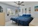 Comfortable bedroom with modern decor and natural light from the window at 9 Logan St, Port Charlotte, FL 33954