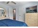 Comfortable bedroom with neutral colors and a modern TV on the dresser at 9 Logan St, Port Charlotte, FL 33954