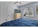 Comfortable bedroom with neutral colors and a modern TV on the dresser at 9 Logan St, Port Charlotte, FL 33954