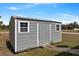 Exterior of the utility shed offers ample storage space at 9 Logan St, Port Charlotte, FL 33954