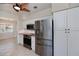 Kitchen area featuring stainless steel appliances, white cabinets, and wood countertops at 125 Ott Cir, Port Charlotte, FL 33952