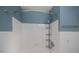 Shower featuring white tiled walls and chrome fixtures at 125 Ott Cir, Port Charlotte, FL 33952