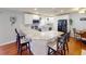 Kitchen featuring white cabinets, stainless steel appliances, and a spacious granite countertop at 1311 Abscott St, Port Charlotte, FL 33952