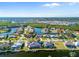 Stunning aerial view showcasing the waterfront community and canal-front homes at 3415 Tripoli Blvd, Punta Gorda, FL 33950