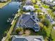 Beautiful aerial view of the home with a boat dock along the canal at 3415 Tripoli Blvd, Punta Gorda, FL 33950