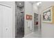 Contemporary bathroom featuring a marble-tiled shower, clean lines, and neutral tones for a serene and sophisticated design at 3415 Tripoli Blvd, Punta Gorda, FL 33950