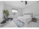 Neutral bedroom featuring clean lines, white bedding, and sleek furniture, creating a modern and minimalist retreat at 3415 Tripoli Blvd, Punta Gorda, FL 33950