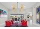 Spacious living area with high ceilings, marble floors, and waterfront views, creating an open and airy ambiance at 3415 Tripoli Blvd, Punta Gorda, FL 33950