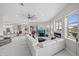 Expansive living area showcasing waterfront views, an open layout, and contemporary furnishings at 3415 Tripoli Blvd, Punta Gorda, FL 33950