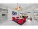 Bright living room featuring stylish decor, marble floors, and expansive windows with waterfront views at 3415 Tripoli Blvd, Punta Gorda, FL 33950