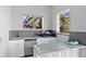 Outdoor kitchen featuring a grill, sink and countertop at 3415 Tripoli Blvd, Punta Gorda, FL 33950