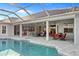 Backyard pool with a large open patio and outdoor seating area at 3415 Tripoli Blvd, Punta Gorda, FL 33950