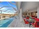 Resort-style outdoor living space with a pool, spa and comfortable seating areas at 3415 Tripoli Blvd, Punta Gorda, FL 33950