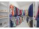 Spacious walk-in closet with ample shelving and hanging space, providing an organized storage solution for any wardrobe at 3415 Tripoli Blvd, Punta Gorda, FL 33950